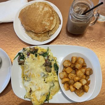 Another Broken Egg Cafe - The Supreme Omelette with potatoes and Buttermilk Pancakes - Cafes Near Me - Memphis, Tennessee