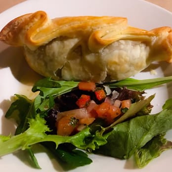 Del Sur Artisan Eats - Roasted Lamb Empanada with a Rosemary spring. Best Empanada I have ever had! - Steakhouses Near Me - Saint Simons Island, Georgia
