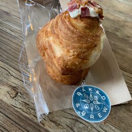 A cruffin is a croissant & muffin. This one had a bacon topping & a surprising amount of delicious whipped cream inside. Yes I ate it all!!