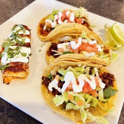 Romero’s Restaurant And Bar - Chicken Enchilada and three tacos