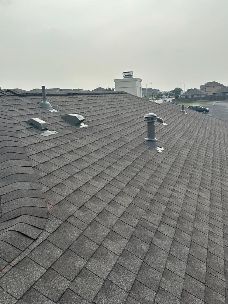 Slide of EZS Roofing & Construction