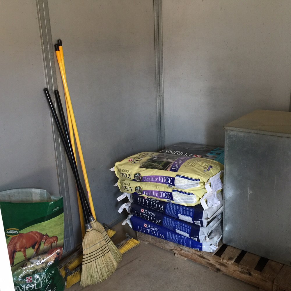 Gold Chip Stables - Feed room looks well organized. - Pet Training Near Me - Bartonville, Texas
