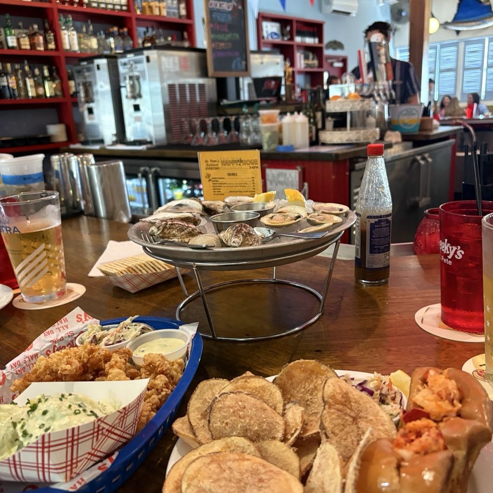 Oysters, lobster roll, clam strips, potato salad, chips