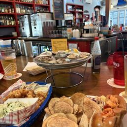 Oysters, lobster roll, clam strips, potato salad, chips