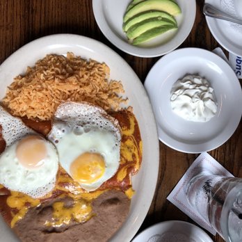 Sylvia's Enchilada Kitchen - Cheese enchilada topped with eggs (our special order). - Mexican Near Me - Houston, Texas