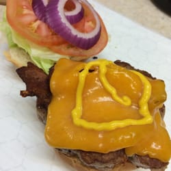 2 Guys N Some Fries - 6oz Banquet Burger with Colby Cheddar Cheese, Crispy Bacon and topped off with Fresh Local Produce.