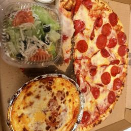 Xl pepperoni pizza(half eaten) chicken Parmesan, side salad. Xl pepperoni pizza(half eaten) chicken Parmesan, side salad.