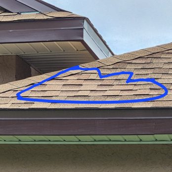 Veritas Roofers - The finished roof, in front of our house - mis-matched shingles which we're told are good enough for a new roof. - Roofing Near Me - Orlando, Florida Veritas Roofers - The finished roof, in front of our house - mis-matched shingles which we're told are good enough for a new roof. - Roofing Near Me - Orlando, Florida