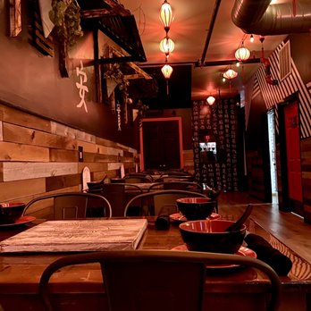 POTS - a long table and chairs in a restaurant - Hot Pot Near Me - Peabody, Massachusetts