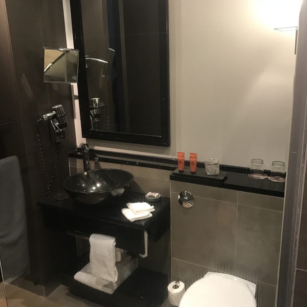The Dominican - Practical and well lit bathroom. - Hotels Near Me - Brussels, BRU The Dominican - Practical and well lit bathroom. - Hotels Near Me - Brussels, BRU