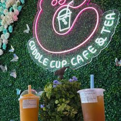 Cuddle Cup Cafe & Tea - Mango Slushy with Mango pop & Passionfruit Green Tea. In addition to the best seller housemade egg waffle