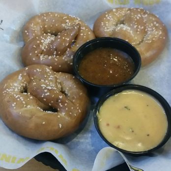 Buffalo Wild Wings - Soft pretzels appetizer with queso and choice of sauce. - American Near Me - Seymour, Indiana
