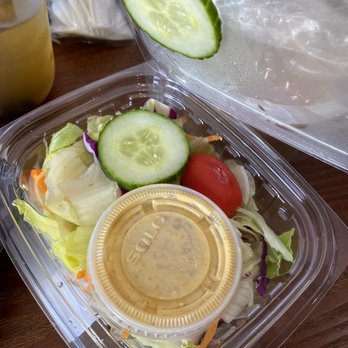 Sakura - a plastic container with a salad in it - Ramen Near Me - Ludlow, Massachusetts