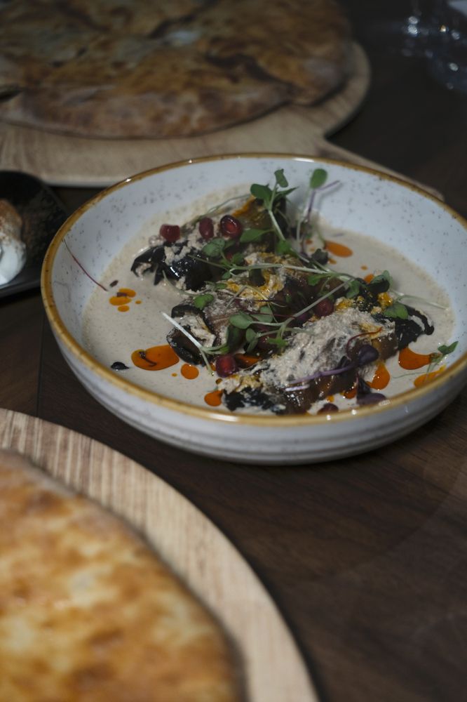 Aromati Cafe and Wine Bar Logo