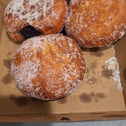 Fresh malasadas. There were four... Fresh malasadas. There were four...