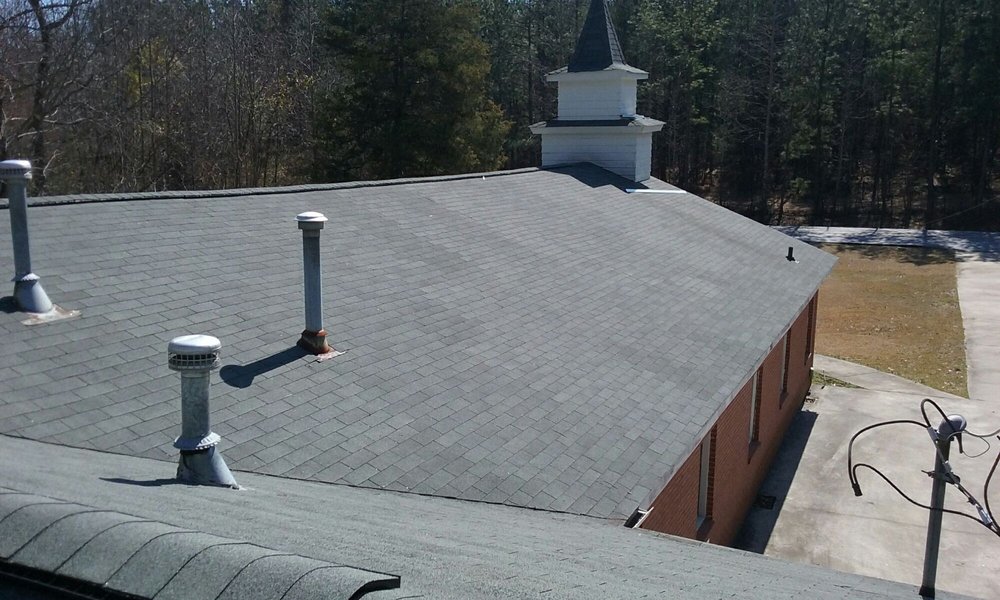 Slide of Tim's Roofing