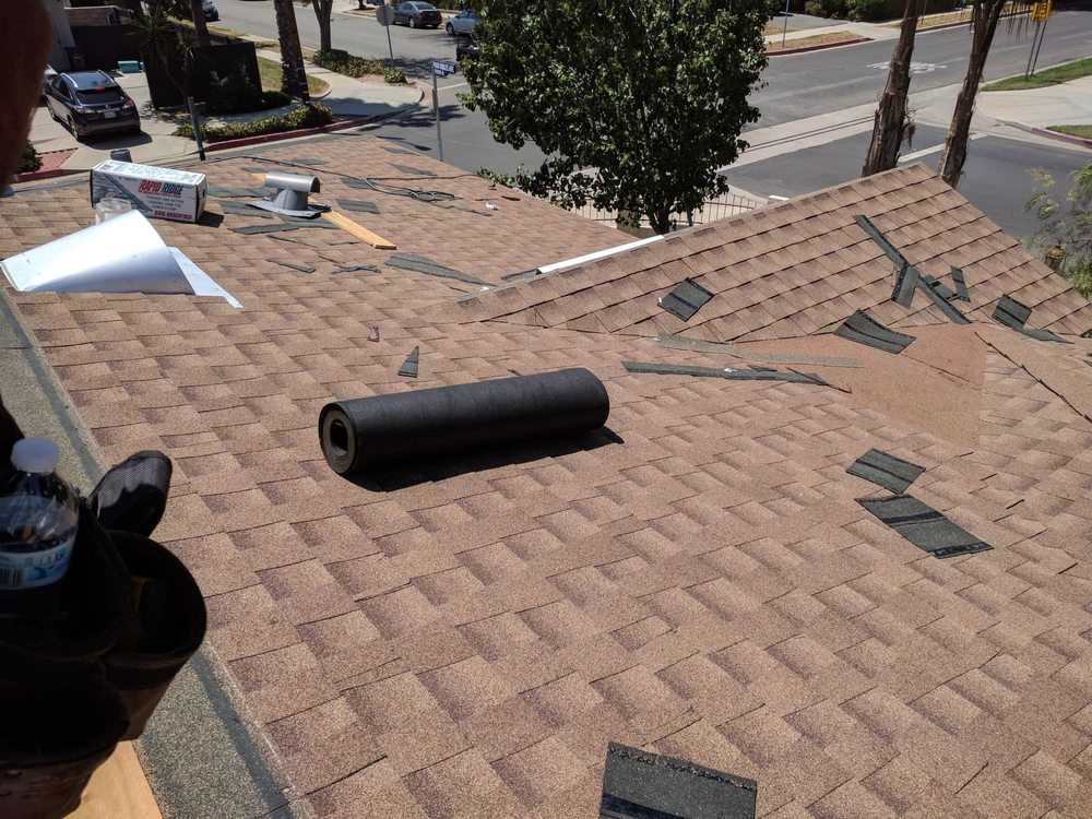 Slide of Delcid Roofing