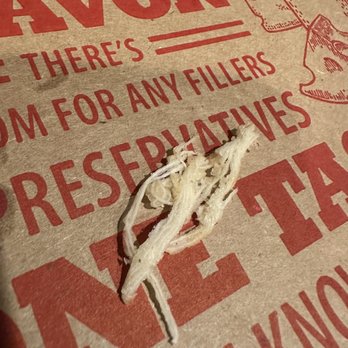 Jet's Pizza - Pulled this wad of string out of my pizza crust. - Pizza Near Me - Fairview Heights, Illinois