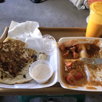 Delhi Kitchen - Chicken tikka masala and garlic naan. Horrible. Bland. Dry. Inconsistent. - Indian Near Me - San Diego, California Delhi Kitchen - Chicken tikka masala and garlic naan. Horrible. Bland. Dry. Inconsistent. - Indian Near Me - San Diego, California