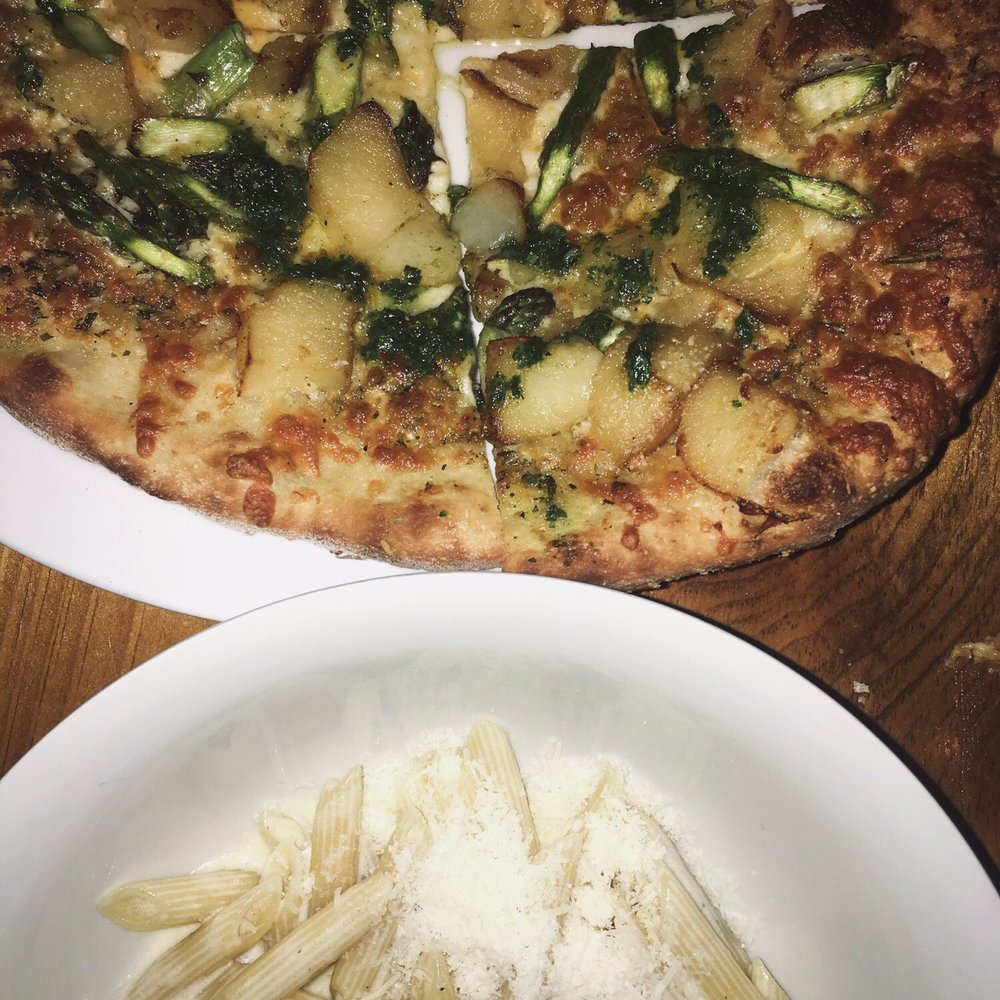 Ital Delli - Béchamel alfredo penne. Asparagus, potato, pesto wood fired pizza. - Italian Near Me - Mont-Tremblant, Quebec Ital Delli - Béchamel alfredo penne. Asparagus, potato, pesto wood fired pizza. - Italian Near Me - Mont-Tremblant, Quebec