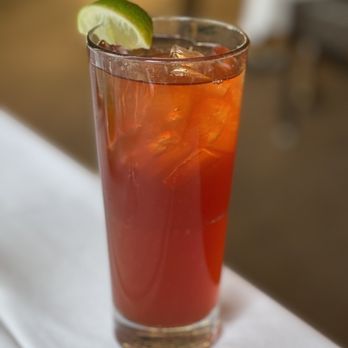 Larkin's - a drink with a lime slice on the rim - Steakhouses Near Me - Greenville, South Carolina