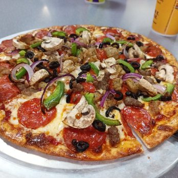 Chuck E. Cheese - a pizza with pepperoni, mushrooms, and peppers - Pizza Near Me - Charleston, West Virginia Chuck E. Cheese - a pizza with pepperoni, mushrooms, and peppers - Pizza Near Me - Charleston, West Virginia