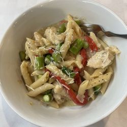 Scola's Restaurant - Pollo Bellissimo (chicken, asparagus, red peppers) served in a deli dish bowl