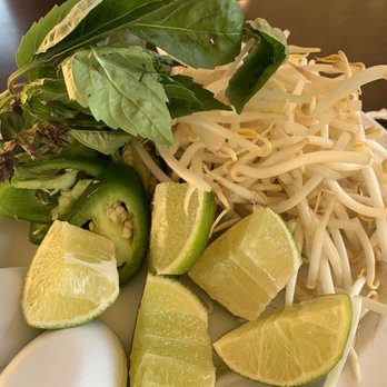 Angkor Restaurant - Generous amount of limes and condiments! - Cambodian Near Me - Fresno, California