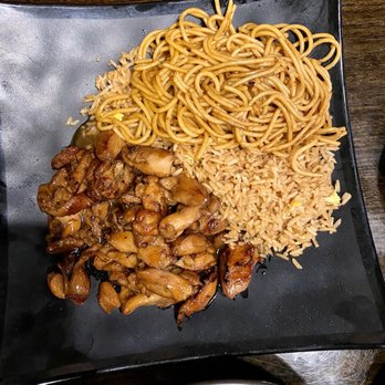 Nikki Asian Bistro - 47. Bourbon Chicken with half fried rice & lo mein noodles. - Pan Asian Near Me - Locust, North Carolina Nikki Asian Bistro - 47. Bourbon Chicken with half fried rice & lo mein noodles. - Pan Asian Near Me - Locust, North Carolina