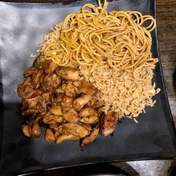 Nikki Asian Bistro - 47. Bourbon Chicken with half fried rice & lo mein noodles.