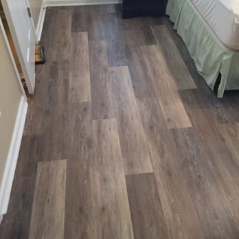 ProSource of Jacksonville - a bedroom with hardwood floors - Flooring Near Me - Jacksonville, Florida ProSource of Jacksonville - a bedroom with hardwood floors - Flooring Near Me - Jacksonville, Florida
