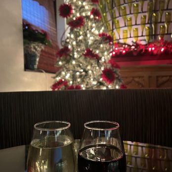 Wooden Door Winery - two glasses of wine and a christmas tree - Wineries Near Me - Vandergrift, Pennsylvania