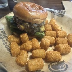 East Coast Wings + Grill - Traditional cheeseburger that was huge for less than $13 dollars. The tater tots are yummy too.