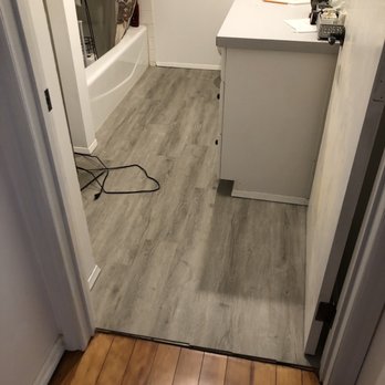 Ace of Hardwoods - After: bathroom - Flooring Near Me