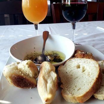 Gennaro's Trattoria - Bread with an olive oil sauce. In addition they obliged me to have my beer served in a wine glass. - Italian Near Me - Canyon Lake, Texas Gennaro's Trattoria - Bread with an olive oil sauce. In addition they obliged me to have my beer served in a wine glass. - Italian Near Me - Canyon Lake, Texas
