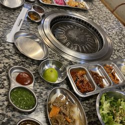 Let's Meat Kbbq - The spread of sides, sauces and garnishes you get without ordering anything beyond KBBQ!