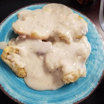 Buttered Biscuit - Large order of biscuits and gravy...attempt to finish at your own risk. - Breakfast & Brunch Near Me - Waynesville, North Carolina