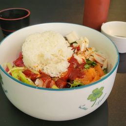 Add rice and spicy sauce and mix.  Hwe dub bab