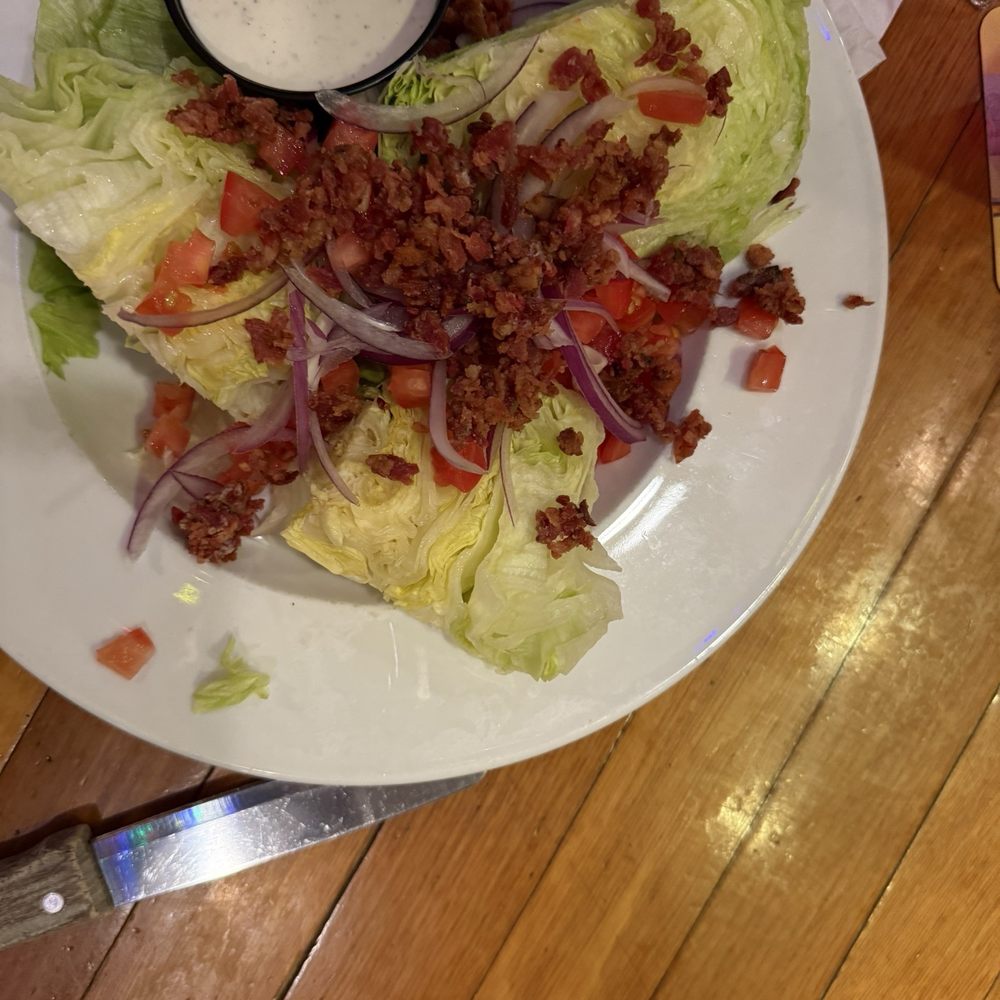 Wedge salad is fresh and dressing is homemade. Wedge salad is fresh and dressing is homemade.