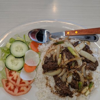 Remton - #61 beef w/sauteed onions over rice w/a side salad. Good but small portion of beef - Vietnamese Near Me - Webster, Texas Remton - #61 beef w/sauteed onions over rice w/a side salad. Good but small portion of beef - Vietnamese Near Me - Webster, Texas