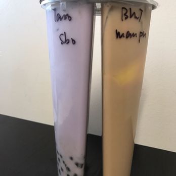 Mr. T Cafe - Their two split milk tea. Left taro with small boba and right their special bmt with mango pudding - Coffee & Tea Near Me - San Francisco, California
