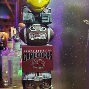 Pinky's Revenge - Carved SCGC statue at bar - Sports Bars Near Me - Taylors, South Carolina Pinky's Revenge - Carved SCGC statue at bar - Sports Bars Near Me - Taylors, South Carolina