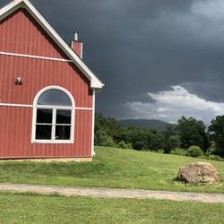 Philip Carter Winery of Virginia - Storm brewing in front of the main building.