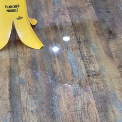 Wet water on the floor not cleaned up to prevent and accident