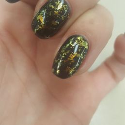 Ring finger filed poorly on one side. Its crooked