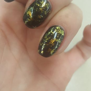 Love Nails - Ring finger filed poorly on one side. Its crooked - Nail Salons Near Me - Los Angeles, California