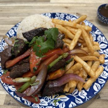 Cuzco's Peruvian Restaurant - The Lomo Saltado. I like to order with an extra side of the gravy that goes one top. - Peruvian Near Me - La Habra, California Cuzco's Peruvian Restaurant - The Lomo Saltado. I like to order with an extra side of the gravy that goes one top. - Peruvian Near Me - La Habra, California