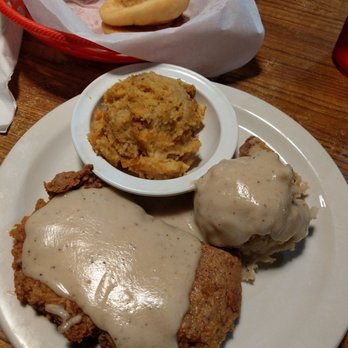 Calico County Restaurant - Chicken fried steak with some odd tasting squash and mashed potatoes. Both taste like dressing, with the same texture. Strange. - Breakfast & Brunch Near Me - Amarillo, Texas