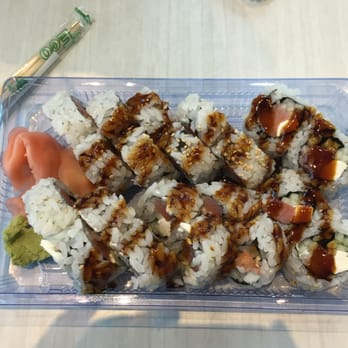 Sushi Bar Sarku Japan - Two Philly rolls (smoked salmon) with eel sauce on top. - Sushi Bars Near Me - Atlanta, Georgia Sushi Bar Sarku Japan - Two Philly rolls (smoked salmon) with eel sauce on top. - Sushi Bars Near Me - Atlanta, Georgia