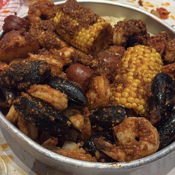 Crab N Spice - AYCE Adult With Peeled Shrimp Black Mussels Corn Sausage Steamed Rice - Seafood Near Me - Carson, California Crab N Spice - AYCE Adult With Peeled Shrimp Black Mussels Corn Sausage Steamed Rice - Seafood Near Me - Carson, California